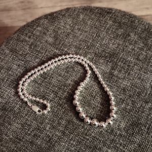 Sterling silver graduated necklace. Never worn.
